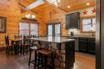 Fully Equipped Kitchen with Granite Countertops & Large Island